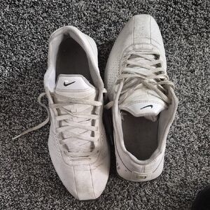 Nike White Low-Top Sneakers with Black Swoosh